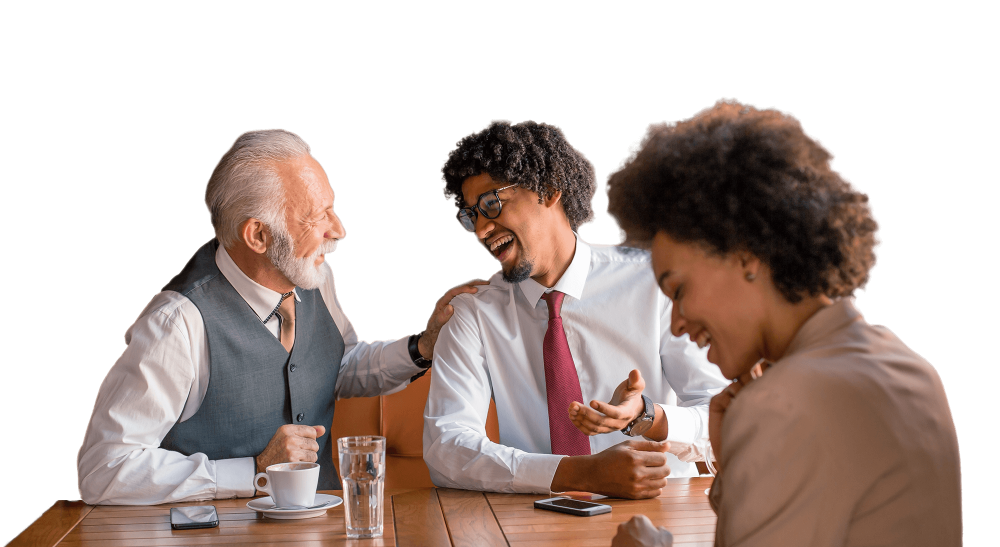 Employees laughing at business meeting