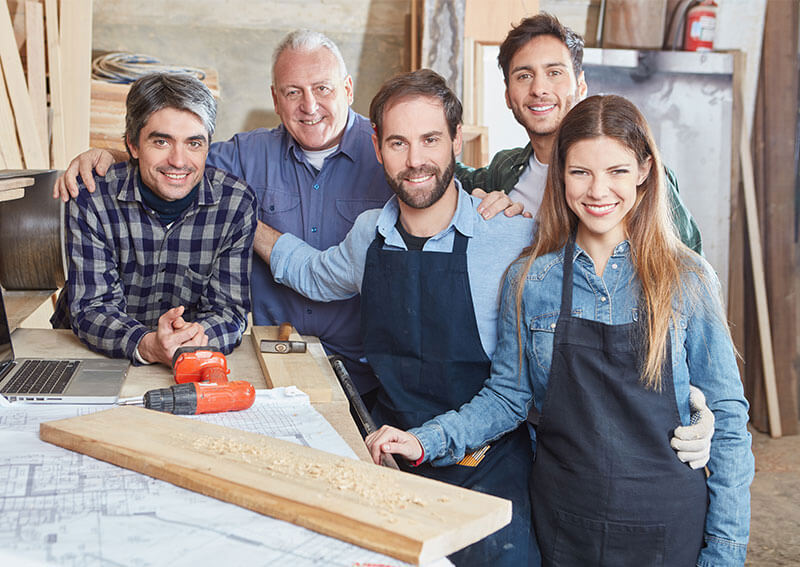 Shop employees smiling