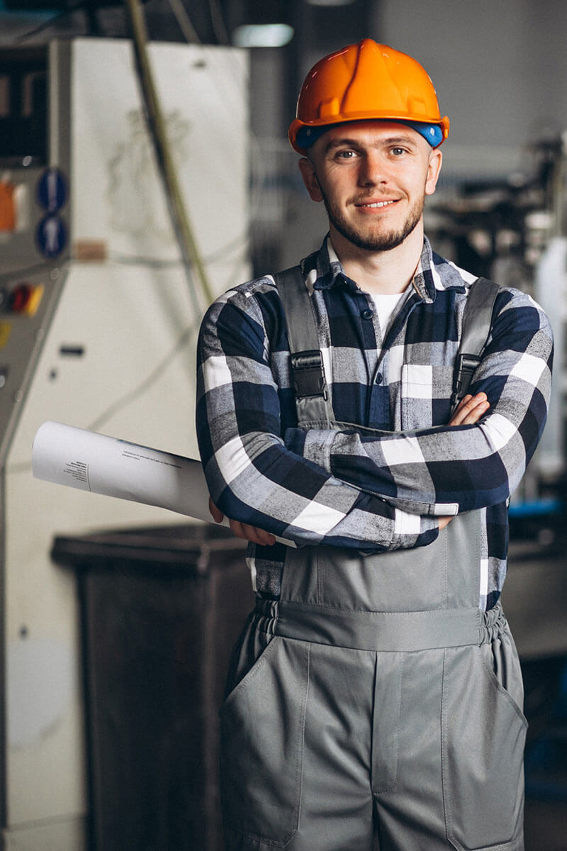 Manufacturing employee smiling