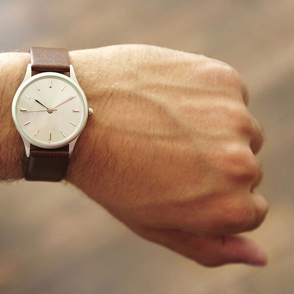 Closeup of someone wearing a wristwatch